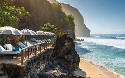The Bulgari resort has its own beach at a spectacular spot down from the cliff.
