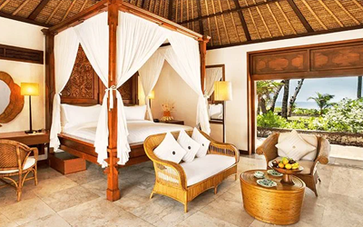 We love the classically designed thatched roof wooden beachfront villas.