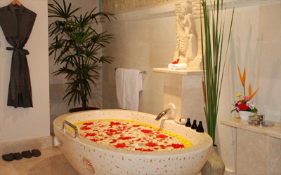 Some rooms feature these massive bath tubs.
